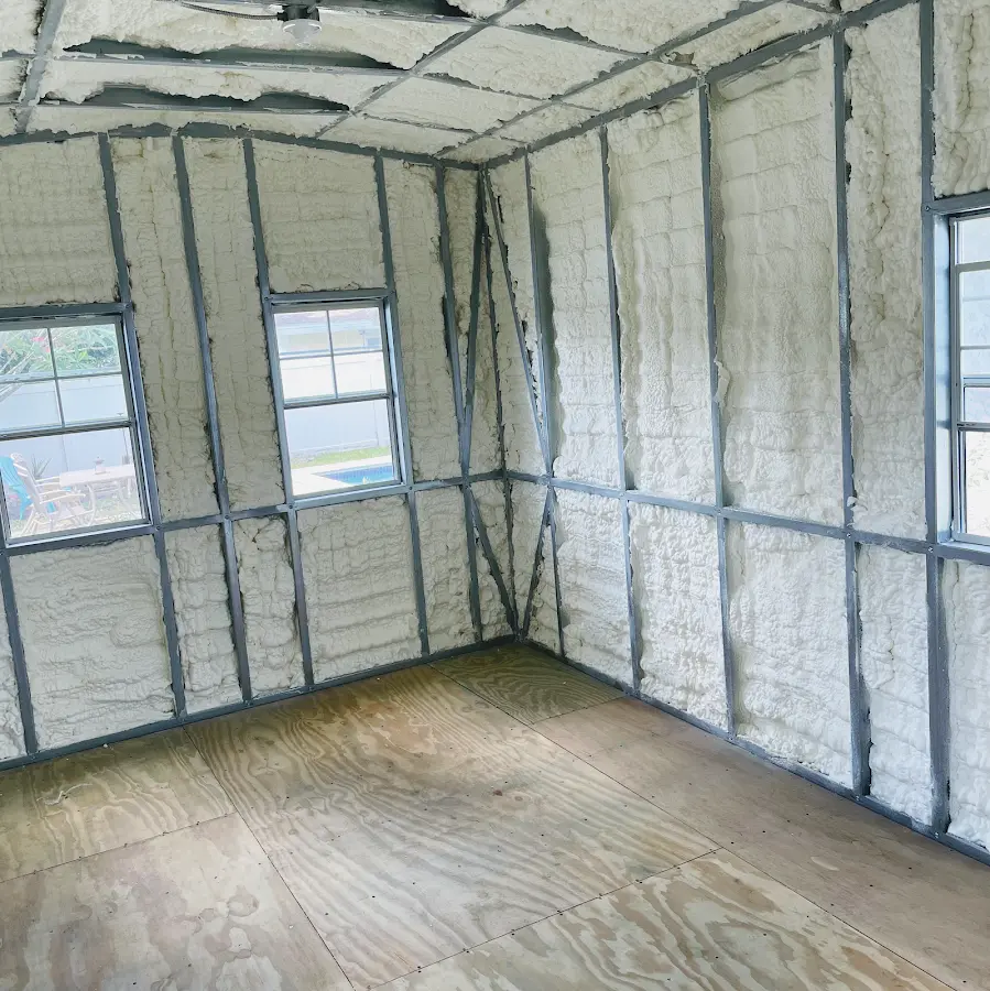 Closed-cell spray foam insulation applied to wall cavities in a residential project in Fairfax
